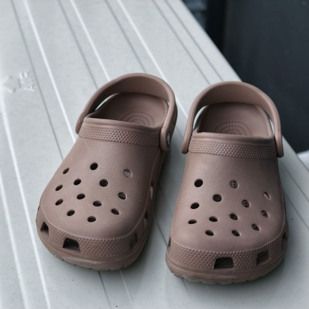 Crocs | Classic Clogs Brown (Size M6 W8) - Original Purchased July 2024 (with Scanned Receipt) (Category: Slippers & Slides) located in Taguig. Submitted by tureesha (Listing ID 1457967485, Image 1). Description: RFS: Too many shoes/decluttering - Brown Crocs clogs - Size 8/9 - Soles show some wear from use, but still have plenty of life left - Easy to slip on and off - Great for casual wear.