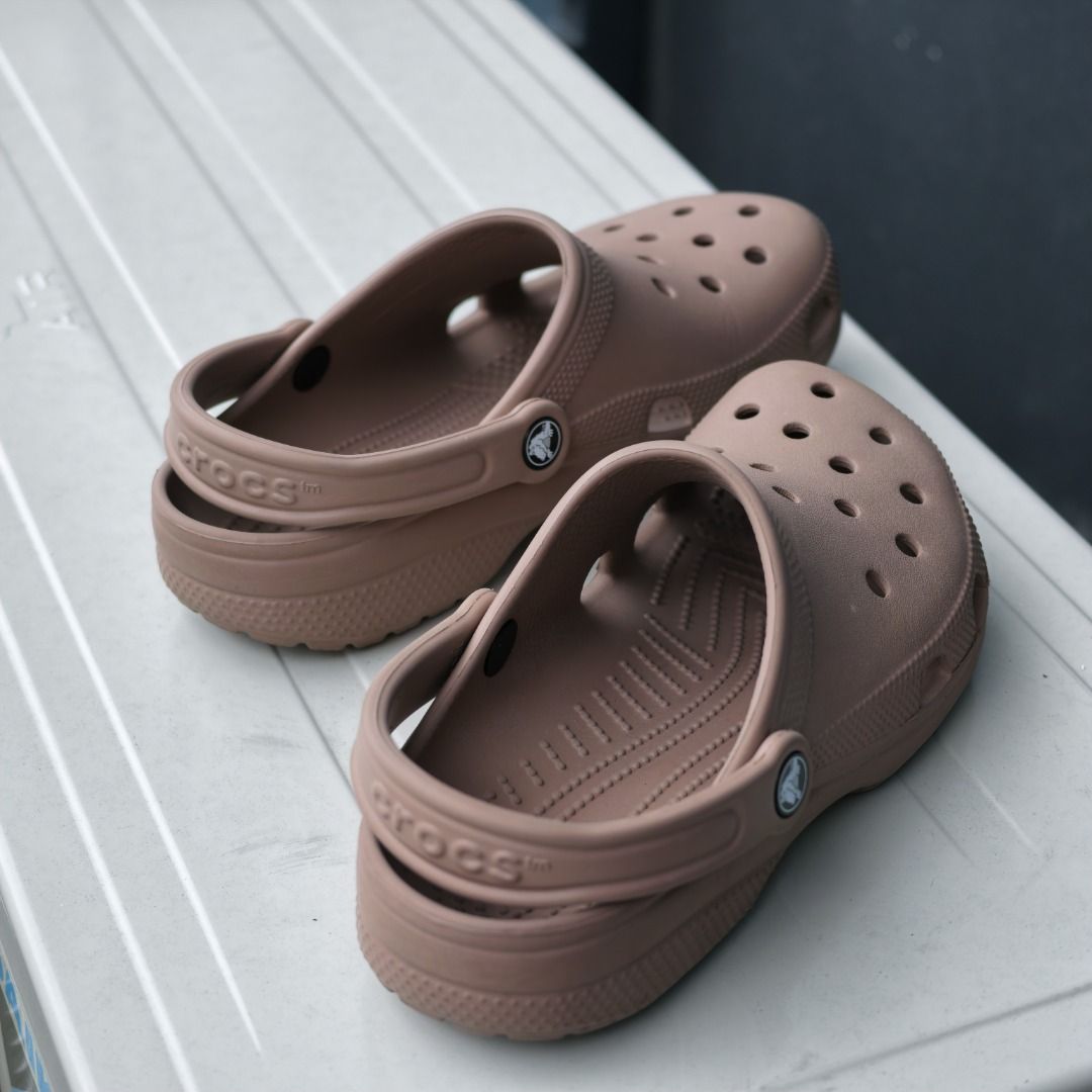Crocs | Classic Clogs Brown (Size M6 W8) - Original Purchased July 2024 (with Scanned Receipt) (Category: Slippers & Slides) located in Taguig. Submitted by tureesha (Listing ID 1457967485, Image 3). Description: RFS: Too many shoes/decluttering - Brown Crocs clogs - Size 8/9 - Soles show some wear from use, but still have plenty of life left - Easy to slip on and off - Great for casual wear.
