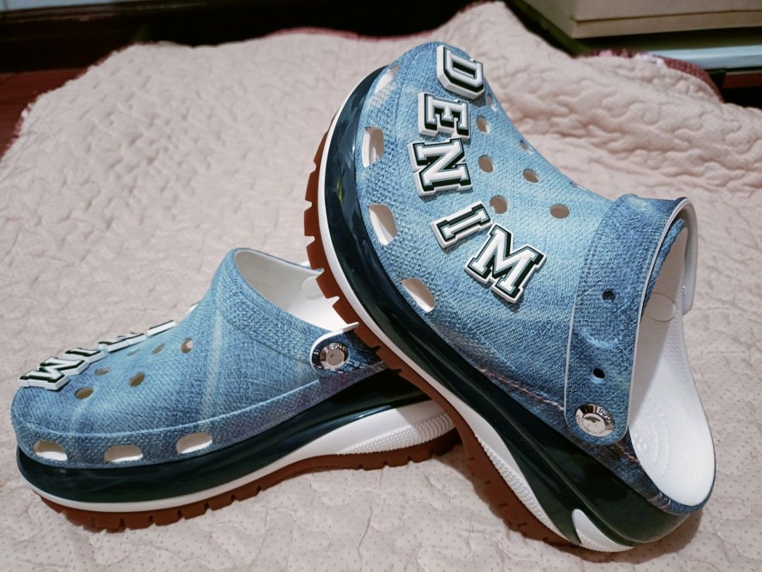 Crocs Mega Crush Clog Denim Jibbitz "DENIM" (Category: Slippers and slides) located in Taytay. Submitted by crizta38 (Listing ID 1457966552, Image 3). Description: - Crocs Mega Crush Clog in Denim Print - Size W7 - "DENIM" Jibbitz Charms included - Chunky sole for added height - Adjustable strap (can be worn up or down) - Ideal for a casual, statement-making look - used but not abused (good as new) - bought in USA, free from doubt😘 RFS: can't st