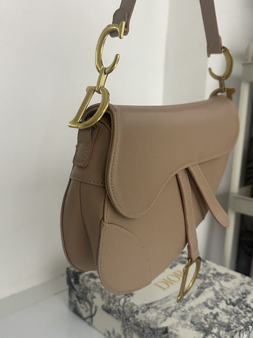 Dior Saddle Bag Beige Leather Gold Hardware (Category: Luxury Bags & Wallets) located in Mabalacat. Submitted by itsaki (Listing ID 1457958862, Image 3). Description: - Christian Dior Saddle Bag - Color: Beige - Condition: Great, barely used - Hardware: Gold - Includes: Original box, dust bag, authenticity cards, tag, extra strap - Comes with: Christian Dior strap.