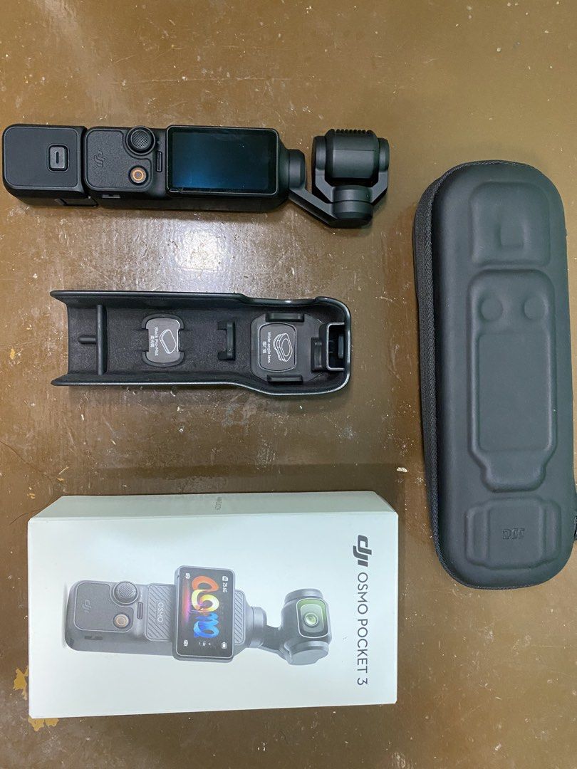 DJI Osmo Pocket 3 Standard Combo (Category: Cameras) located in Baguio. Submitted by coolphoenix_3bf738 (Listing ID 1458025515, Image 1). Description: - DJI Osmo Pocket 3 Standard Combo - Includes: Camera, Protective Case, original box, hard & silicone case - Ideal for vlogging and capturing smooth, stable footage - Ready for your next adventure! 2 months old RFS: need funds.