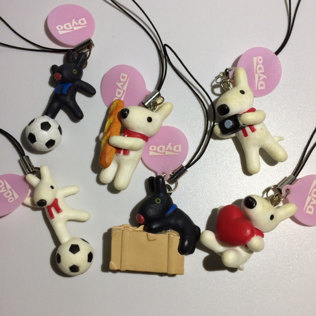 dydo x gaspard and lisa / phone strap keychains (6/12) (Category: Character Goods) located in Quezon City. Submitted by _frieren_ (Listing ID 1458065618, Image 1). Description: 🔖 dydo drinco, gaspard and lisa, strap, keychain, phone charm, trinkets, anik anik, collectibles.