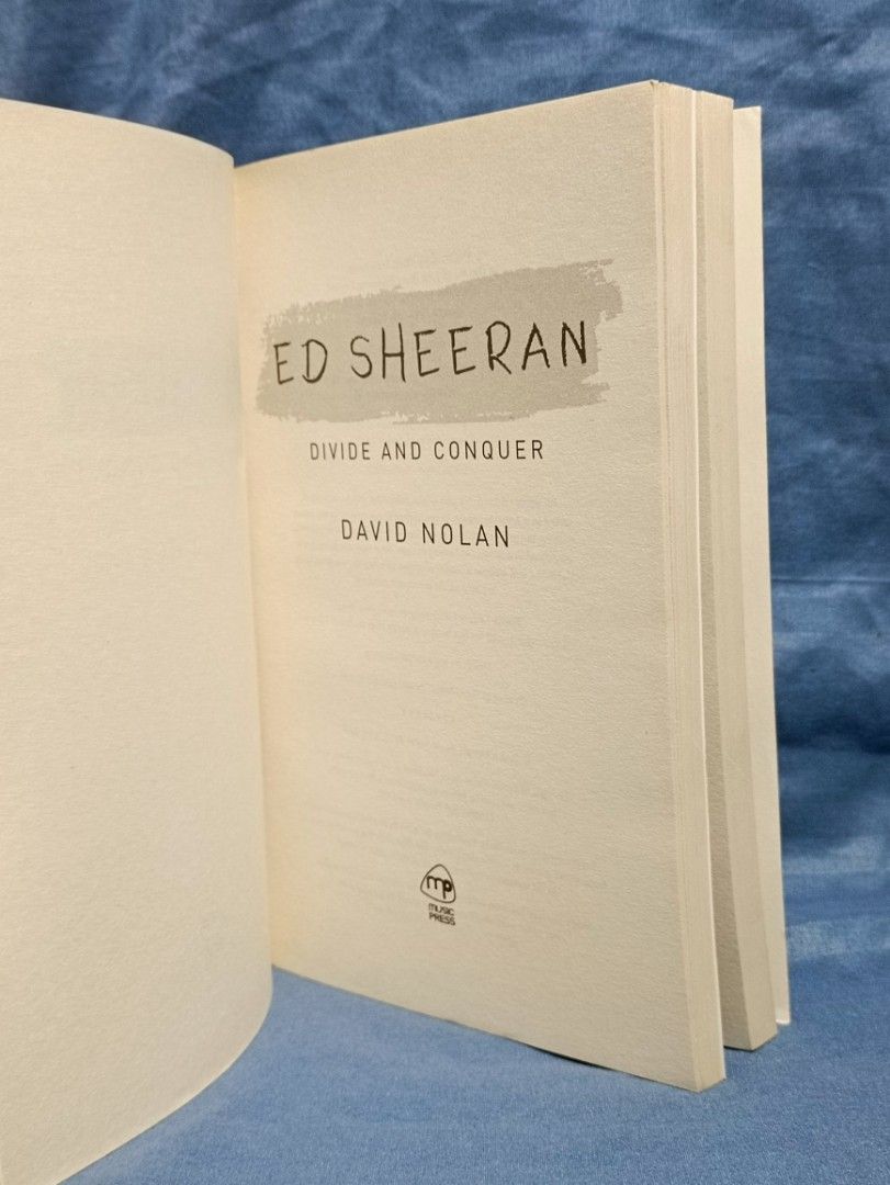 Ed Sheeran Divide and Conquer The Biography by David Nolan (Category: Storybooks) located in Manila. Submitted by krishna_ayanami (Listing ID 1458067720, Image 2). Description: - Biography of Ed Sheeran titled 'Divide and Conquer' - Written by David Nolan - Details his life and career - Includes introduction and table of contents - Published by Music Press - A great read for any Ed Sheeran fan.
