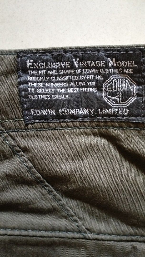 EDWIN Exclusive Vintage Model Cargo Pants Size M (Category: Jeans) located in Angeles City. Submitted by mightywhale_13072f (Listing ID 1457914798, Image 3). Description: - Brand: EDWIN - Color: Olive Green - Style: Cargo Pants - Fit: Relaxed - Size: M (Waist 78cm, Hips 96cm) - Features: Multiple pockets with zip and button closures - Ideal for: Casual wear - Condition: Please check photos for details.