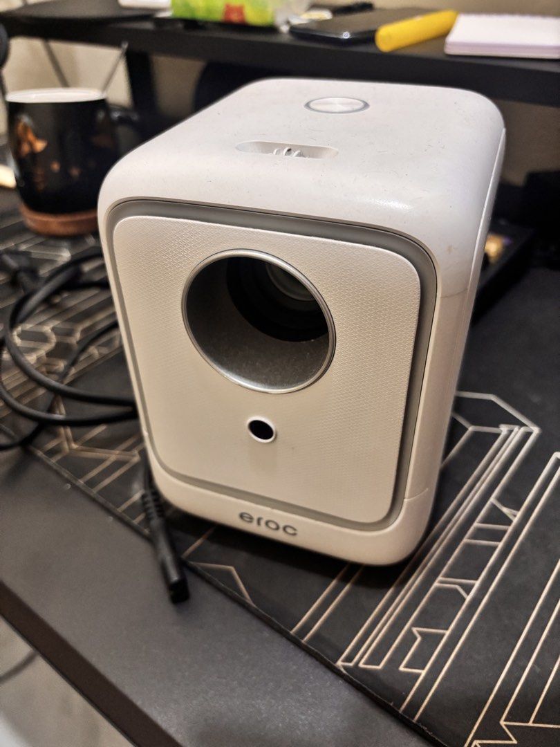 Eroc Magic Pro + Screen and stand (Category: Projectors) located in Manila. Submitted by axiionn (Listing ID 1458034677, Image 1). Description: Selling our barely used projector, screen, and stand. Good for those who don't want a TV and can move stuff around. Issues - Projector: None, only used for a few times tas tinago na. Wala na box though. So need lang punasan. Issues - Screen: Not an issue but wala talaga syang parang pang roll up sakanya k