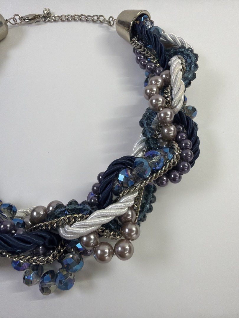 Ever New Multi-strand Beaded and Braided Statement Necklace (Category: Necklaces) located in Quezon City. Submitted by shoppingcartmnl (Listing ID 1457972712, Image 3). Description: - Chunky statement necklace - Features navy blue cords, silver chains, grey pearls, and blue crystal beads - Silver-tone clasp and extender chain - Bold accessory to complete any outfit - Measures approximately 18 inches with a 3-inch extender.