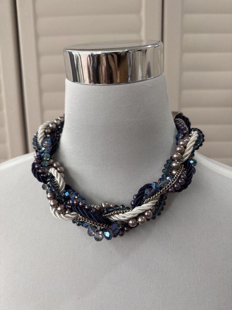 Ever New Multi-strand Beaded and Braided Statement Necklace (Category: Necklaces) located in Quezon City. Submitted by shoppingcartmnl (Listing ID 1457972712, Image 1). Description: - Chunky statement necklace - Features navy blue cords, silver chains, grey pearls, and blue crystal beads - Silver-tone clasp and extender chain - Bold accessory to complete any outfit - Measures approximately 18 inches with a 3-inch extender.