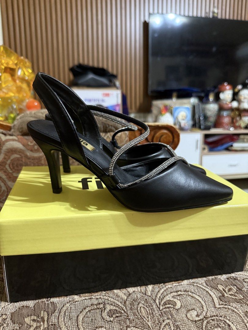 FIGLIA Pointed Rhinestone Slingback Heels (Category: Heels) located in Santo Tomas. Submitted by abhie.143 (Listing ID 1457975349, Image 3). Description: ▫️Used only once, looks new! ▫️Size 36 ▫️Black leather finish ▫️3-3.5 inches heel height ▫️Nakakaputi & sexy ng feet ▫️Bought this at SM Store for ₱1,499 With 2 free heel tips!! RFS: No longer needed.