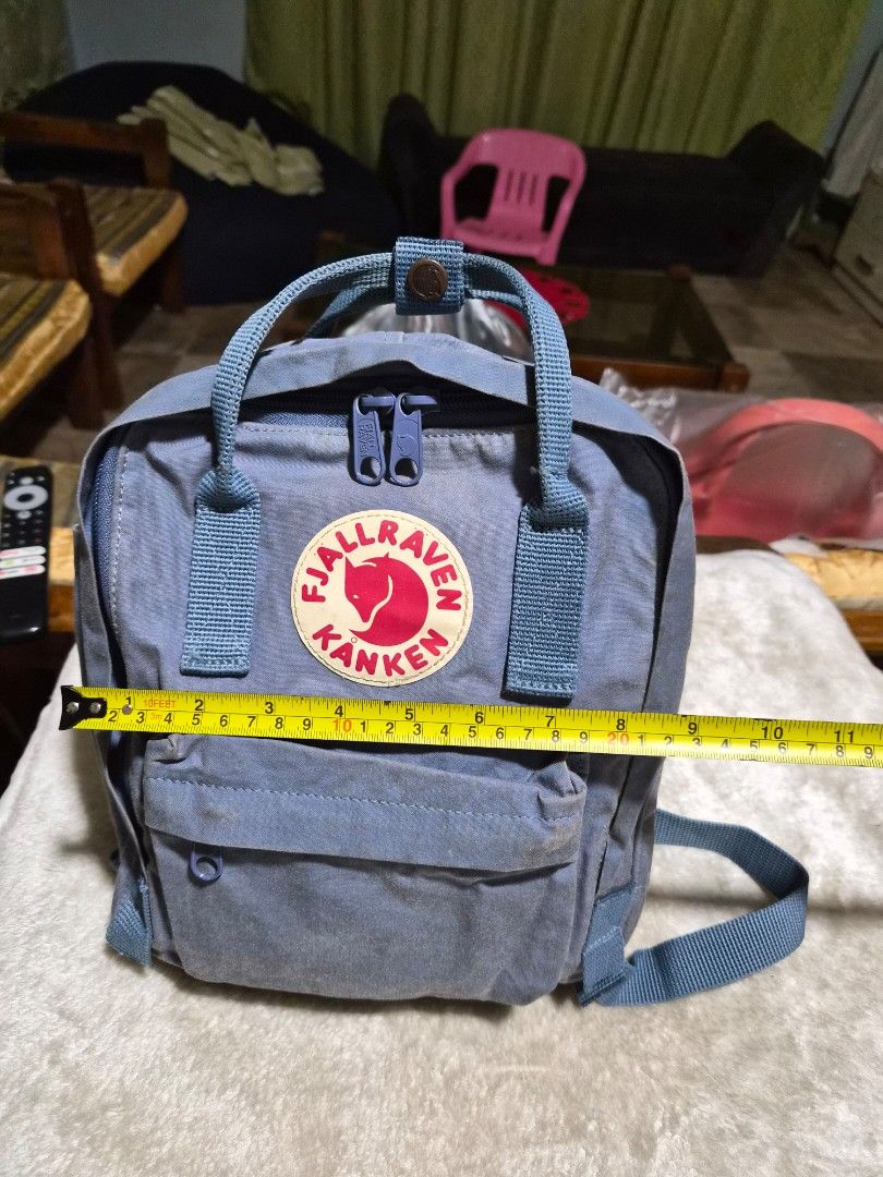 Fjallraven Kanken Mini Backpack Blue (Category: Backpacks) located in Mandaue City. Submitted by chuchi152615 (Listing ID 1458084625, Image 3). Description: - Authentic blue Fjallraven Kanken Mini backpack - Features the iconic logo on the front - Zippers are in excellent working condition - Includes a convenient front pocket and spacious main compartment - Adjustable shoulder straps for a comfortable fit - Compact size: approximately 11 inches t