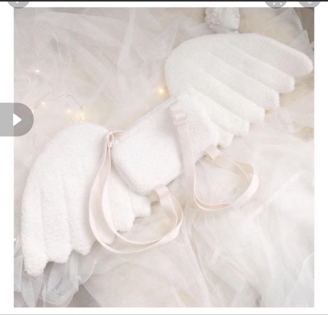 Fluffy White Angel Wings Costume Accessory (Category: Other Accessories) located in Pasig City. Submitted by lmbasa (Listing ID 1457989648, Image 3). Description: - Super cute fluffy white angel wings - Ideal for costumes, parties, and photoshoots - Features easy-to-wear straps - Made with soft, comfortable material - Adds a whimsical touch to any outfit.
