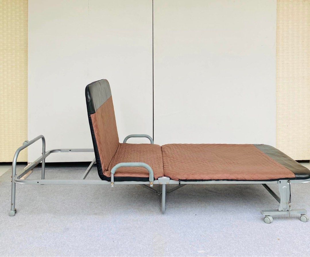 FOLDING & MANUAL RECLINING BED (Category: Other Home Furniture) located in Manila. Submitted by _chinixx (Listing ID 1458095731, Image 2). Description: "JAPAN SURPLUS" FOLDING & MANUAL RECLINING BED SIZE: 80L" x 36W" x 12H" inches (AS-IS ITEM) IN GOOD CONDITION.