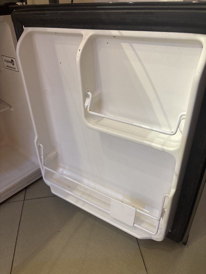 Fujidenzo Mini Fridge (Category: Refrigerators and Freezers) located in San Juan City. Submitted by tropicbling (Listing ID 1457996291, Image 3). Description: - Fujidenzo mini fridge - Silver exterior - Interior shelves and door compartments - Exterior shows some scuffs and marks - Interior has some staining - Works well - needs cleaning - no history of repair.