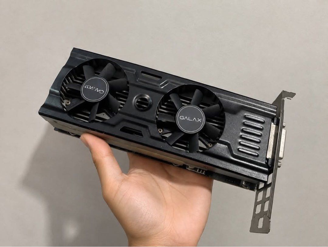 Galax Graphics Card Dual Fan (Category: Other Accessories) located in Santa Rosa. Submitted by 3ftyyyszz (Listing ID 1457993774, Image 1). Description: - Galax Dual Fan Graphics Card - Black casing with silver accents - Efficient dual-fan cooling system - Standard bracket for easy PC installation - Tested and confirmed working - Perfect for your next PC build!.