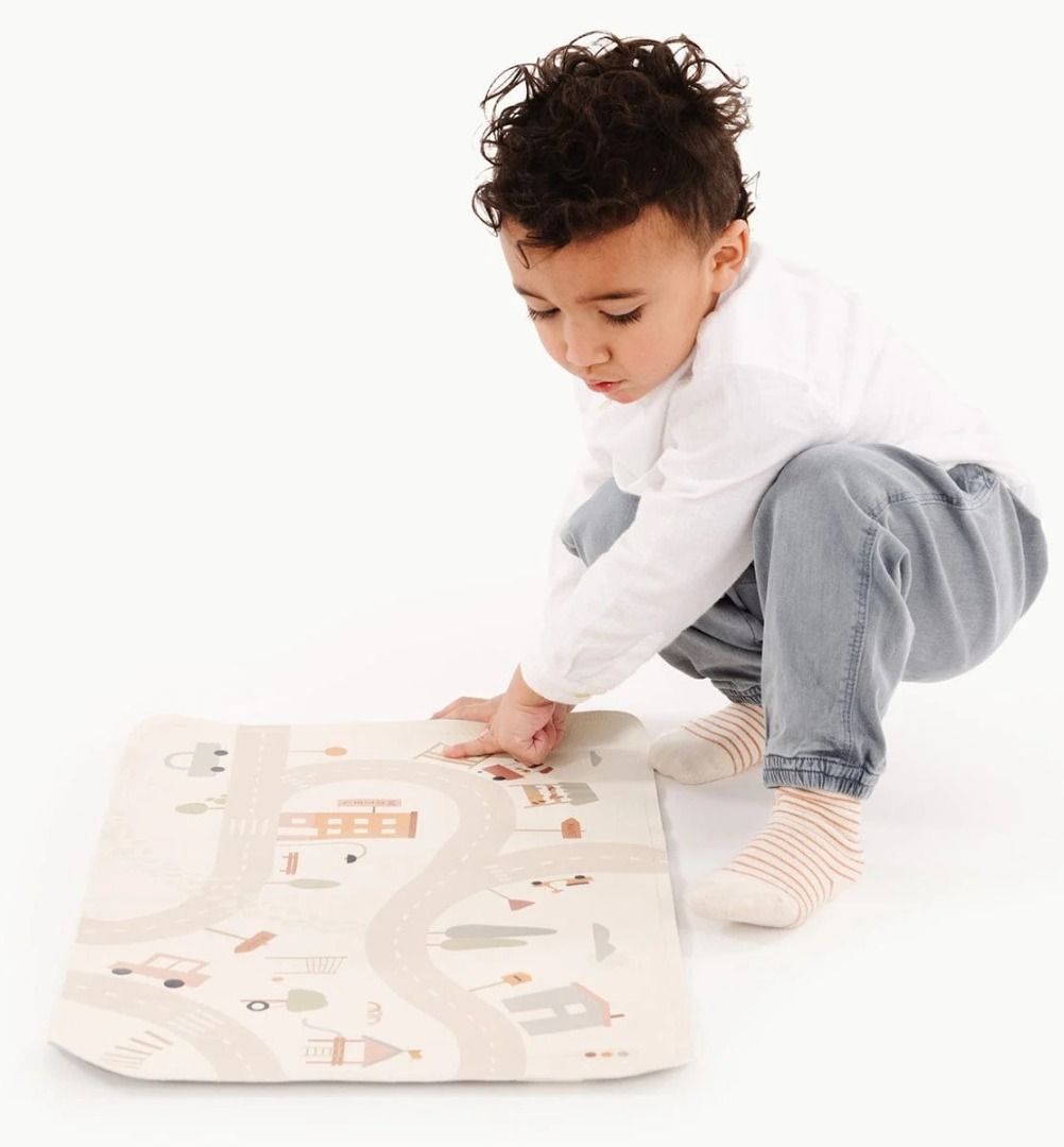 Gathre Micro Leather Playmat - Block (Category: Infant Playtime) located in Makati City. Submitted by travelfinds34611 (Listing ID 1457983820, Image 2). Description: Gathre Leather Mat, Size: Micro, Design: Block BRAND NEW. SMALL HOLE IN THE PAPER OF PACKAGING FROM SHIPPING (see photo #6 for close up) - Can be used as a play mat, place mat, diaper pad/changing mat - Portable and great for playtime on the go or tummy time. - Adorable town and road