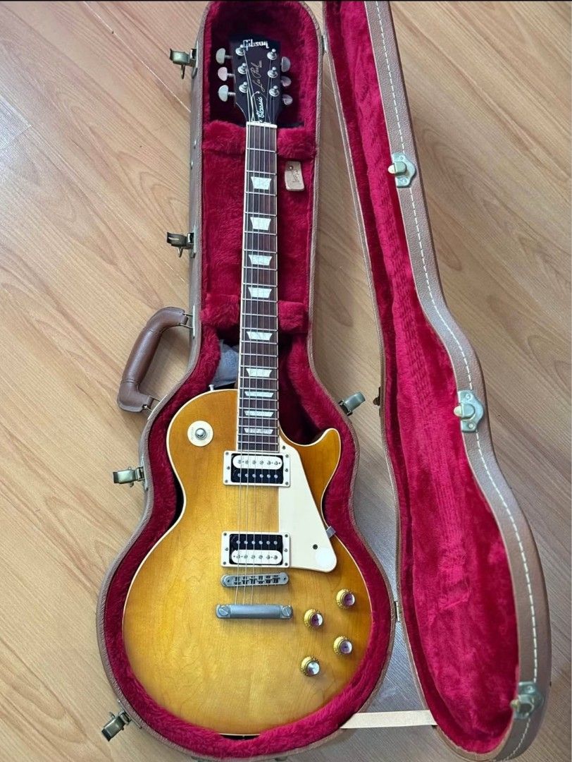 Gibson Les Paul Classic 2021 (w/ case) (Category: Musical Instruments) located in Quezon City. Submitted by writtenbyfire (Listing ID 1457940701, Image 1). Description: Gibson Les Paul Classic 2021 (honey burst finish) with OHSC, strap, wrench and papers Specs: - slim taper neck - modern weight relief - 24.75 scale length - grover tuning keys - tune-o-matic bridge - Gibson 61 burstbuckers set RFS: medical funds Location: Monumento / Quezon City.