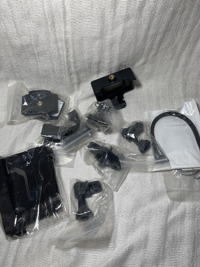 Giraffe Print Pouch with RANDOM Action Camera Mounts and Straps (Category: Camera Bags & Carriers) located in Manila. Submitted by prima_onda (Listing ID 1457964271, Image 3). Description: - Action camera accessory kit - Comes with a cute giraffe print pouch - Includes various black plastic mounts and straps - All items individually bagged for easy organization.