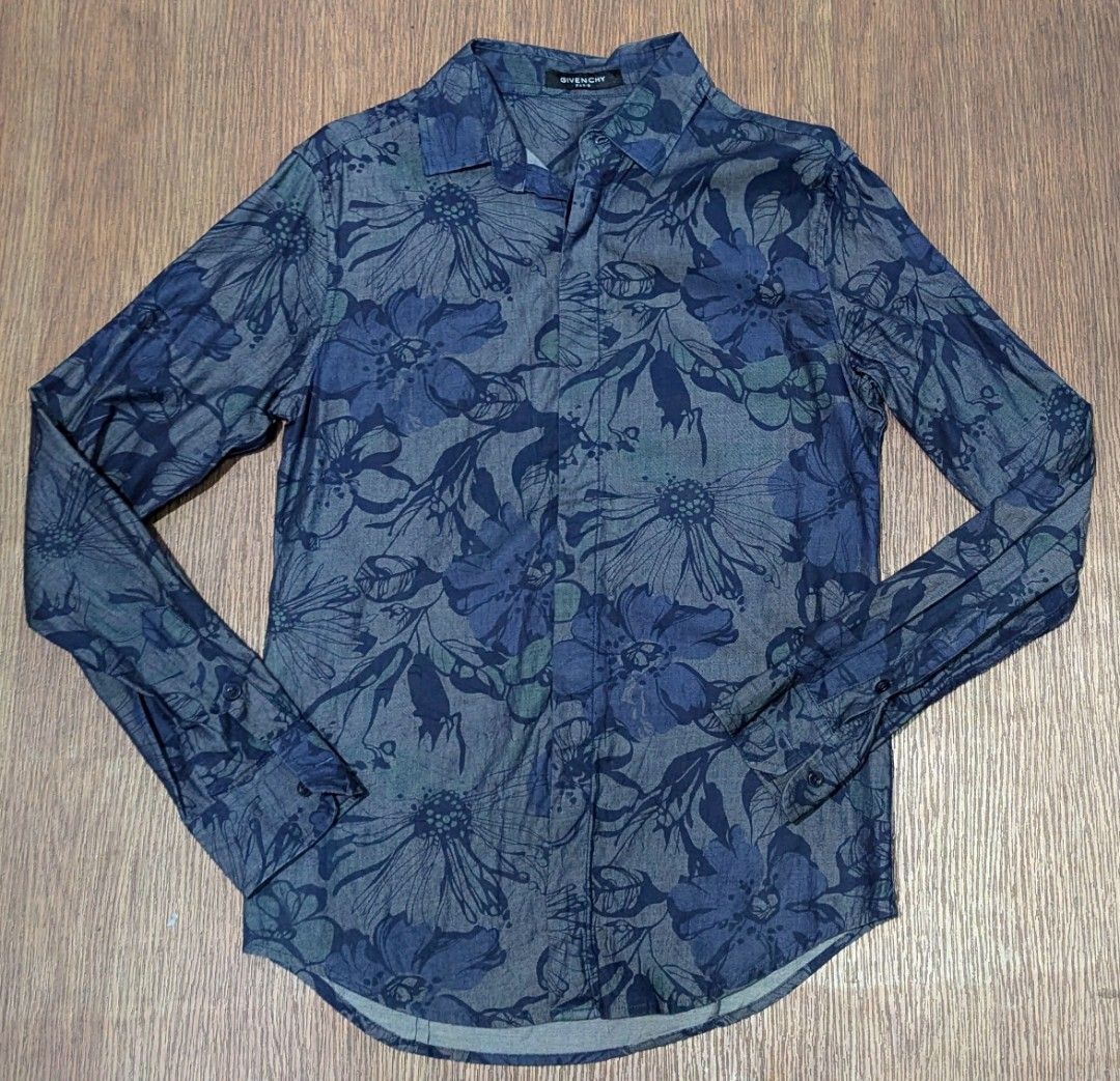 Givenchy long sleeves (Category: Longsleeves) located in Baguio. Submitted by second_handchic (Listing ID 1457948222, Image 1). Description: This is a Givenchy long-sleeve button-down shirt featuring an all-over blue and grey floral print. in excellent condition size small dimension: 17.5 inches length armpit to armpit by 26 inches height DM for more information.