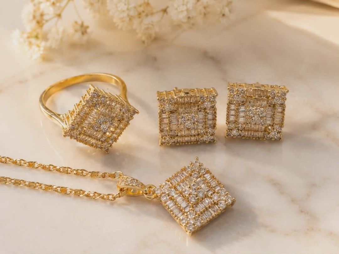 Gold Diamond Ring, Earrings, and Pendant Set (Category: Earrings) located in Bulacan. Submitted by hunterherojapanjdm (Listing ID 1457962706, Image 1). Description: - Exquisite gold jewelry set in micron settings - Includes: Ring(size8), Pair of Earrings, Pendant with Chain - Embellished with small baguette and round cut diamonds - Elegant square shape with a diamond pattern - Adds a touch of luxury to any outfit.