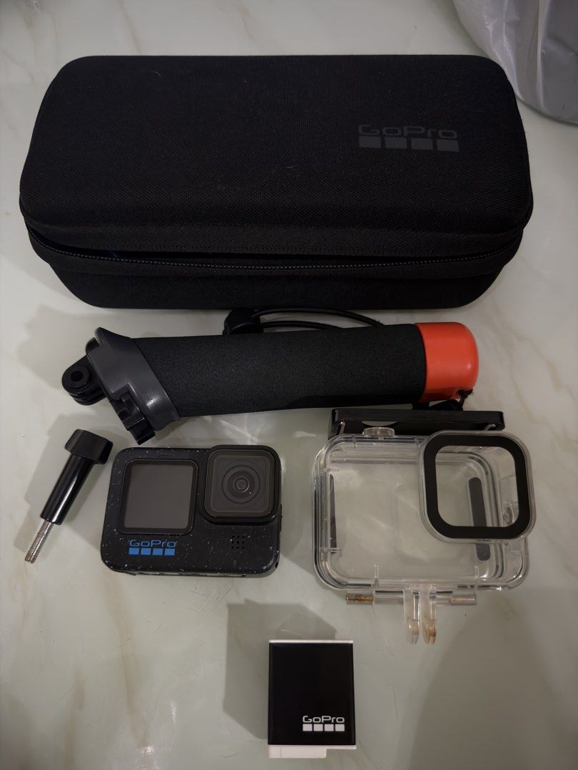 GoPro HERO 12 Black Action Camera with Accessories (Category: Cameras) located in Quezon City. Submitted by joeryan_dechavez (Listing ID 1458007669, Image 1). Description: - GoPro HERO 12 Black action camera - Includes carrying case - Floating hand grip for water activities - Waterproof housing for underwater shots - Original battery for extended recording - Ideal for sports, travel, and capturing all your adventures.