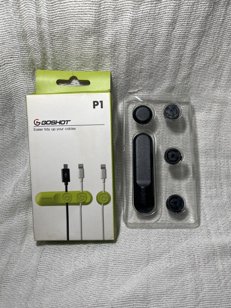 GOSHOT P1 Magnetic Cable Organizer (Category: Cables & Adaptors) located in Manila. Submitted by prima_onda (Listing ID 1457963438, Image 1). Description: - GOSHOT P1 Magnetic Cable Organizer - Effortlessly tidies cables with its magnetic design - Accommodates different cable sizes - Comes with a pedestal and buttons - Perfect for organizing your desk or car - Made in China.