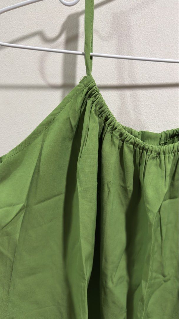 Green Cami Top with Tie Back (Category: Sleeveless) located in Cebu City. Submitted by ngl.prelovedstuff (Listing ID 1457911521, Image 3). Description: - Adorable green cami top - Adjustable spaghetti straps for a comfortable fit - Ruched neckline with elastic detail - Back tie closure for a customizable fit - Lightweight fabric, ideal for warm weather - Versatile for dressing up or down - can fit up to medium size.