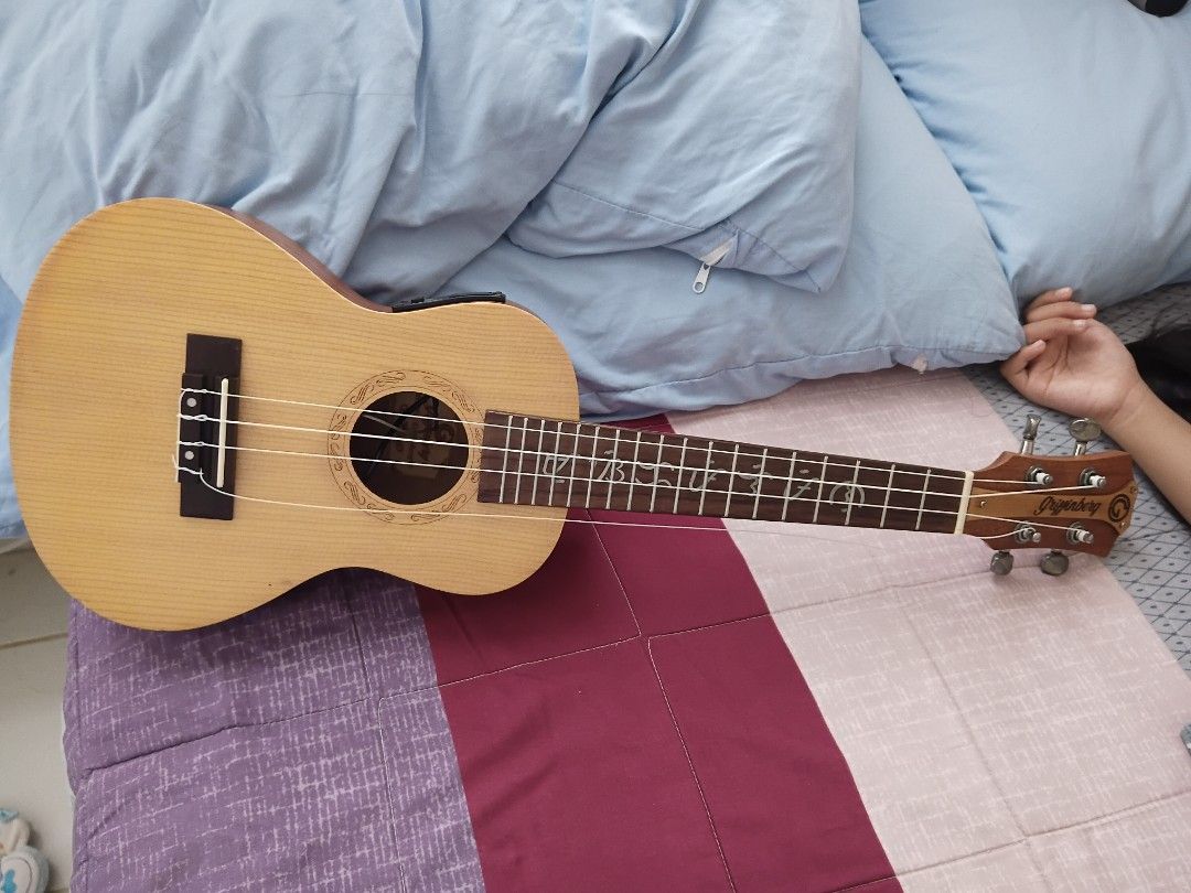 Griffinberg Model G-8 Electric Ukulele (Category: Musical Instruments) located in Manila. Submitted by sofia.2019 (Listing ID 1457923535, Image 1). Description: - Griffinberg G-8 Electric Ukulele - Natural wood finish - Built-in tuner and EQ - Ideal for beginners and experienced players - Ready to plug in and play - Selling because it's not used often.