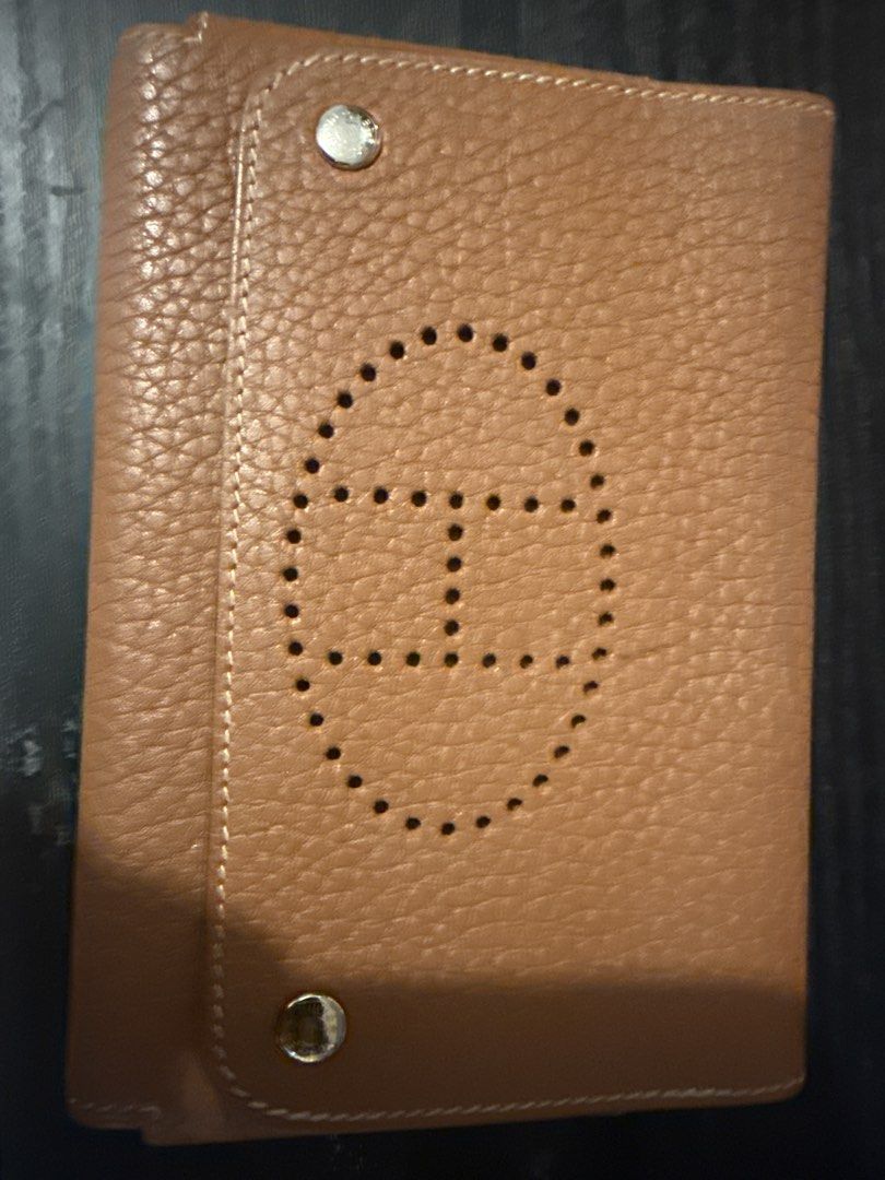 Hermes Brown Leather Wallet with H Logo (Category: Luxury Bags & Wallets) located in Manila. Submitted by better2026 (Listing ID 1457946314, Image 1). Description: - Genuine brown leather wallet - Features iconic Hermes H logo perforation - Secure snap button closure - Classic and timeless design - Perfect for organizing cards and cash.