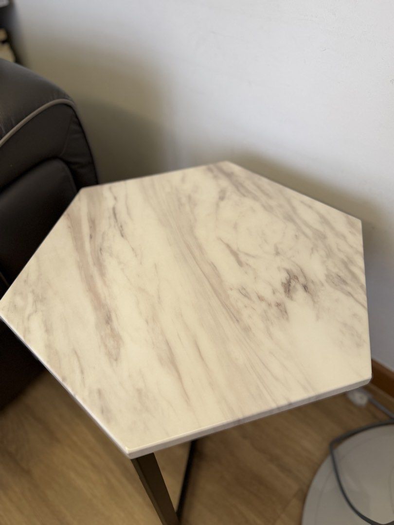 Hexagonal Marble Side Table (Category: Tables & Sets) located in Singapore. Submitted by yourfashionspace (Listing ID 1457929177, Image 3). Description: Condition as seen in photos Never notice any defects Help me clear! Self pick up only. Item is heavy so no delivery Slightly negotiable for same day pick up .
