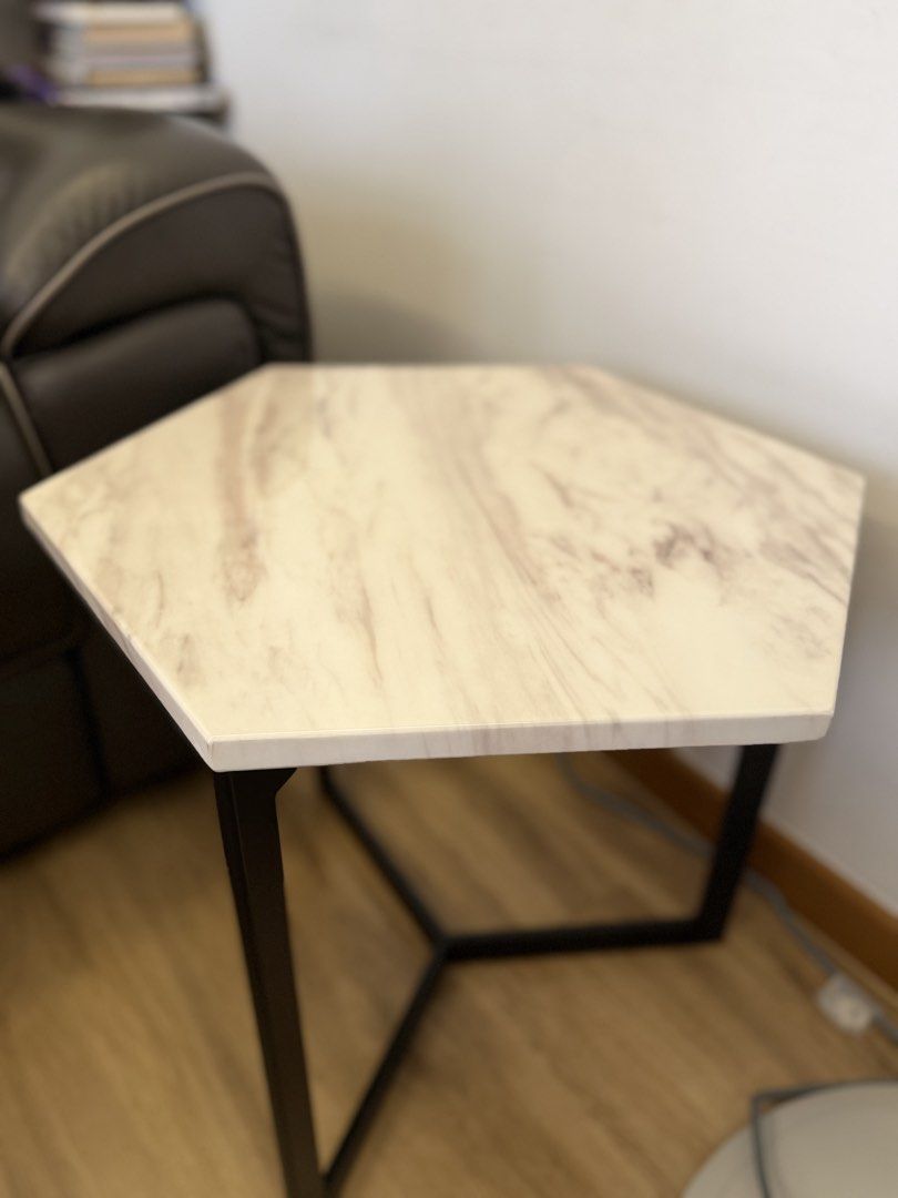 Hexagonal Marble Side Table (Category: Tables & Sets) located in Singapore. Submitted by yourfashionspace (Listing ID 1457929177, Image 1). Description: Condition as seen in photos Never notice any defects Help me clear! Self pick up only. Item is heavy so no delivery Slightly negotiable for same day pick up .