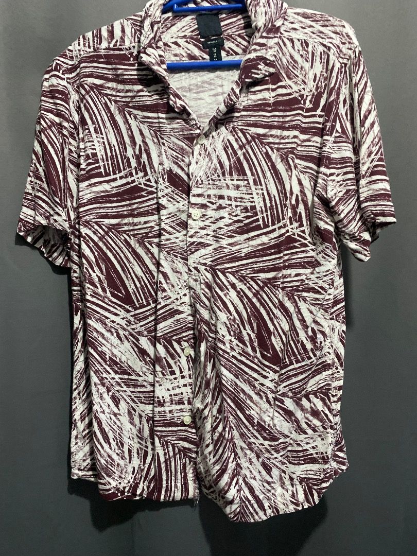 H&M Short Sleeve Button Up Shirt Size S (Category: Tshirts & Polo Shirts ) located in Pasig City. Submitted by gege_dr (Listing ID 1457929006, Image 2). Description: - H&M Short Sleeve Shirt - Burgundy and White Leaf Print - Regular Fit - Button Up Front - Perfect for Casual Wear - Size: S - Price: Php 250 RFS: Mga damit na di na gagamit. All in good condition Payment option: Gcash or Bank Transfer. No COD Loc: Pasig Shipping thru Lalamove Messag