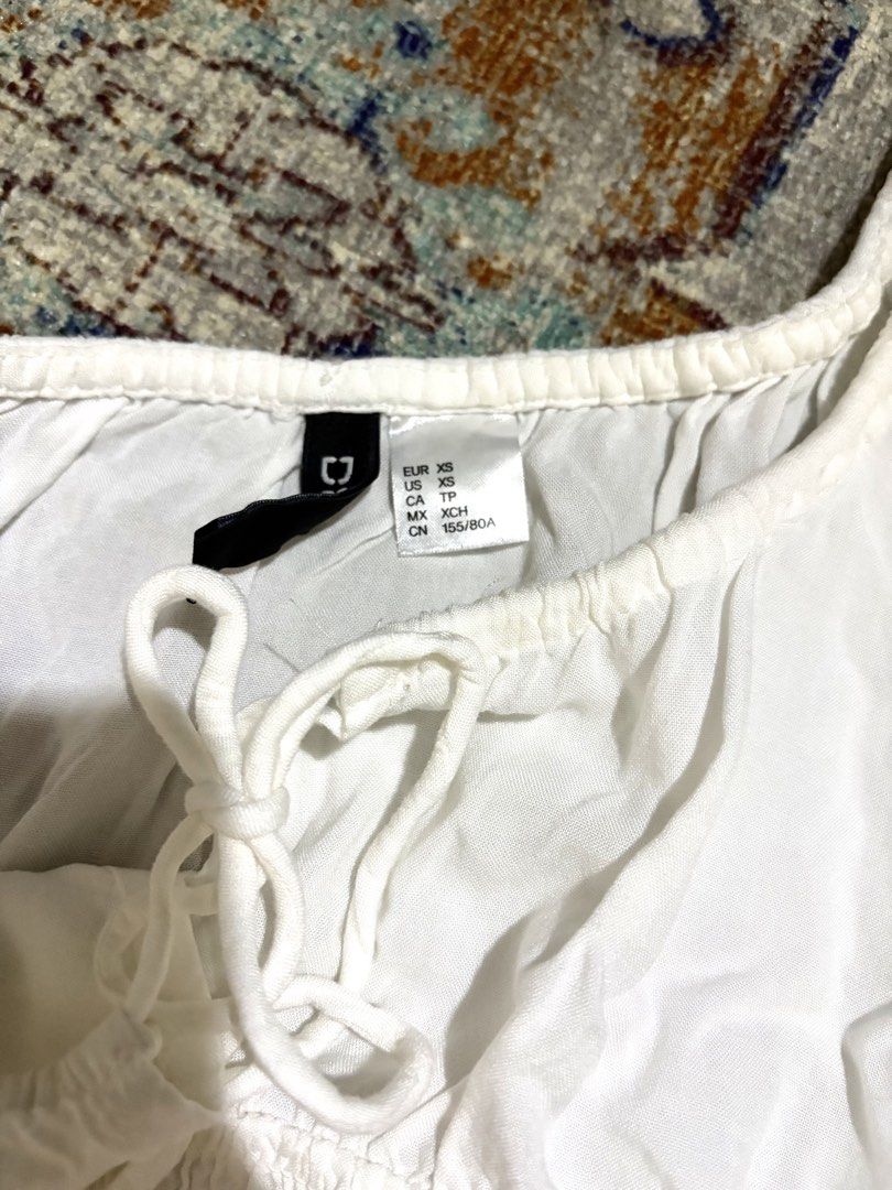 H&m white puff smocked off shoulder top (Category: Blouses) located in Manila. Submitted by declutter_diariess (Listing ID 1458082935, Image 3). Description: .