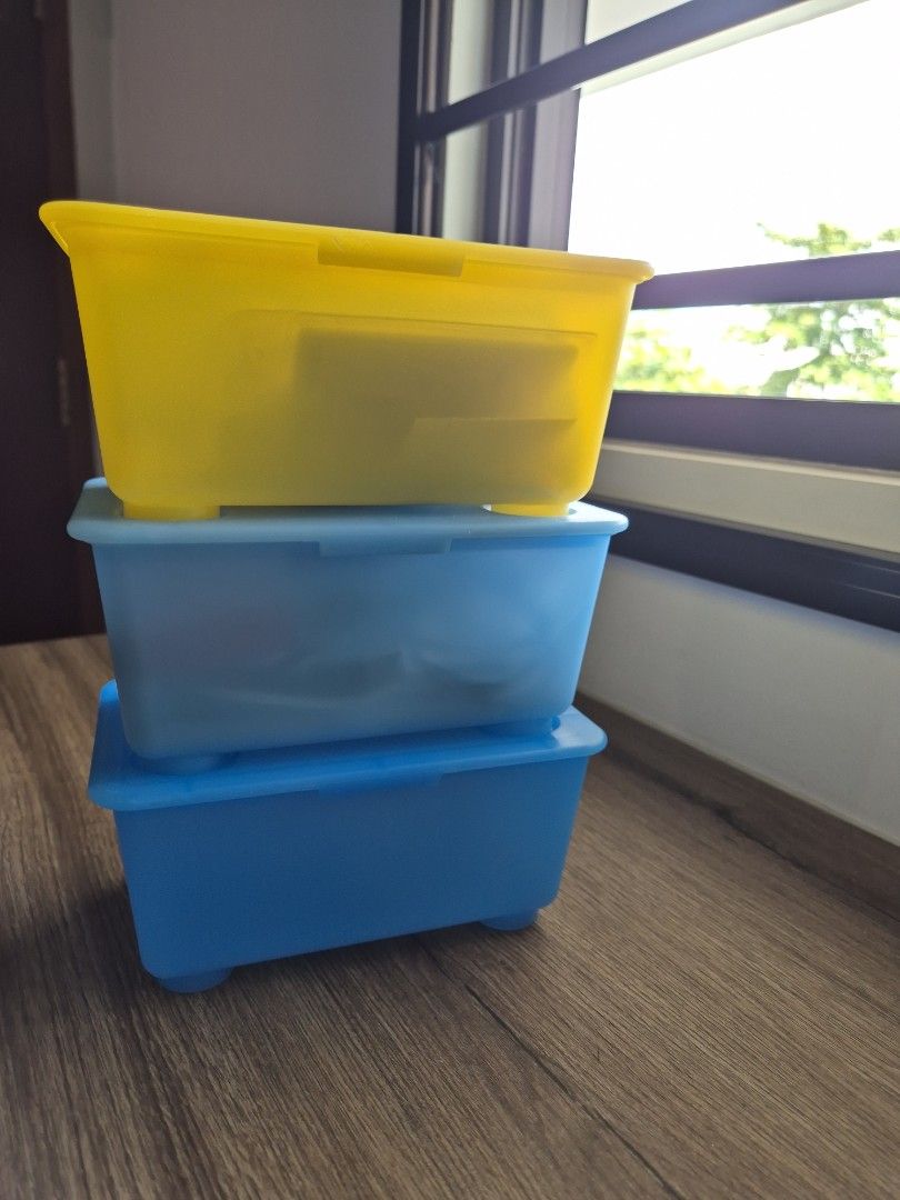 Ikea stackable storage boxes 3 pcs (Category: Storage Boxes & Baskets) located in Singapore. Submitted by mg_sell_buy (Listing ID 1457947822, Image 1). Description: - Set of 3 Ikea storage boxes (17 × 10 cms) - Includes two blue boxes and one yellow box - features a convenient detachable hinged lid - Ideal for organizing small items - Adds a touch of color to your space.