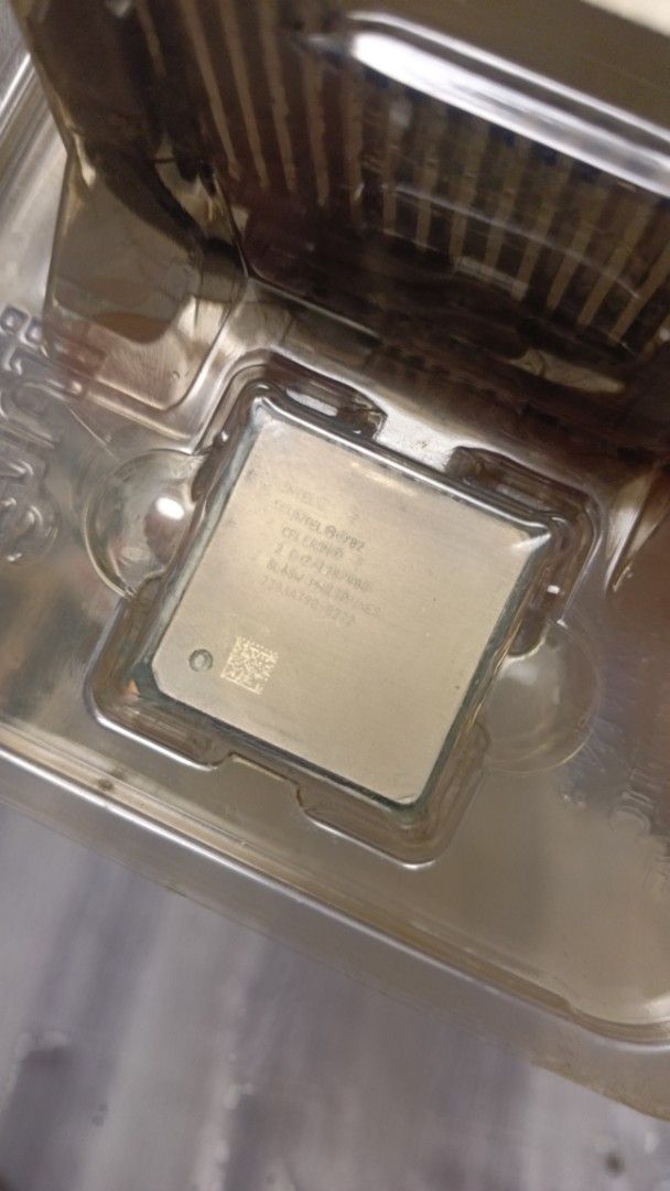 Intel Core i7 CPU with Stock Cooler (Category: Desktops) located in Quezon City. Submitted by victorald25831 (Listing ID 1458013146, Image 2). Description: - Intel Core i7 Processor (Model visible in photos) - Original Intel Stock Cooler included (Fujikura compatible) - Both items in original packaging - Perfect for PC upgrades.