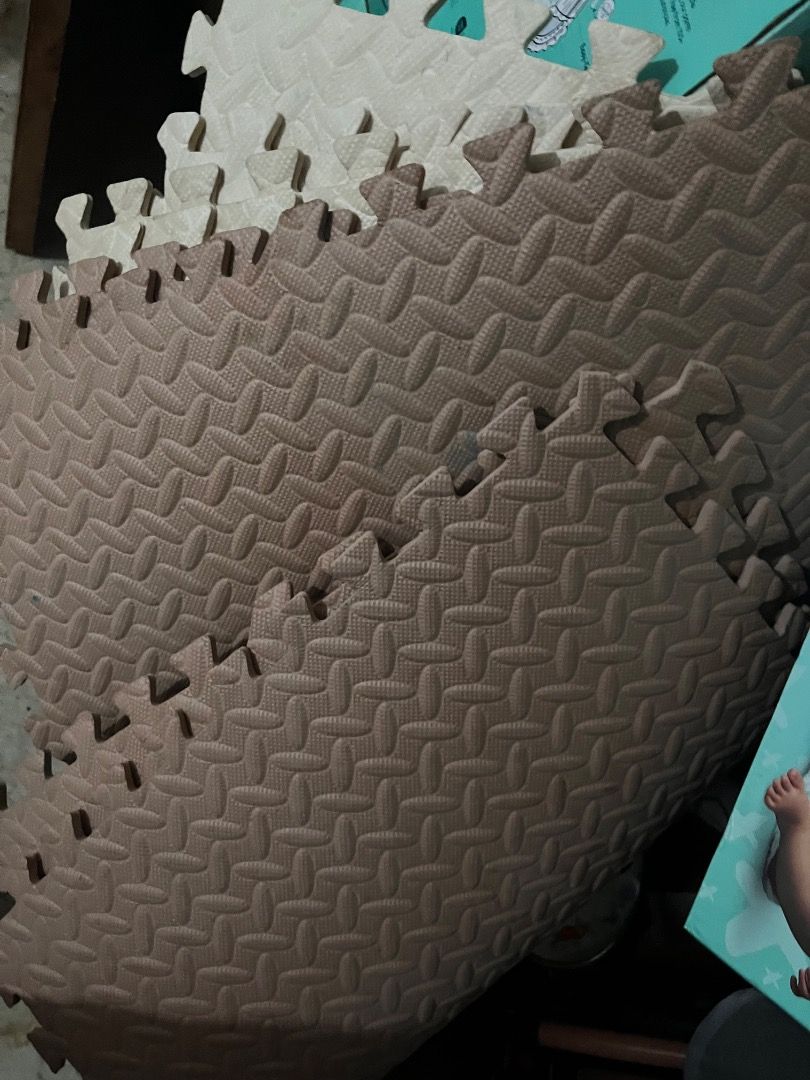 Interlocking Foam Play Mat Tiles 4pcs white 4pcs brown (Category: Infant Playtime) located in Muntinlupa City. Submitted by keenlion_22f510 (Listing ID 1457983266, Image 3). Description: - Interlocking foam play mat tiles - Textured surface for enhanced grip - Simple to assemble and disassemble - Ideal for creating safe play areas or workout spaces - Available in multiple pieces - Colors: 4Beige and 4Brown 350 take all need lang sanitize .