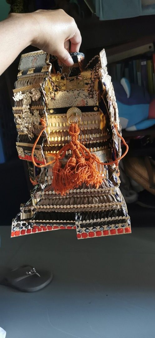 Japanese Samurai Armor Set with Helmet - Decorative Display (Category: Vintage Collectibles) located in Cavite. Submitted by theathea22 (Listing ID 1457912536, Image 2). Description: - Authentic-looking Japanese samurai armor set - Includes a detailed helmet with intricate design, tassels, and ornate metalwork - Ideal for display or collection - Approximately [insert height] tall - Perfect for enthusiasts of Japanese culture and history.