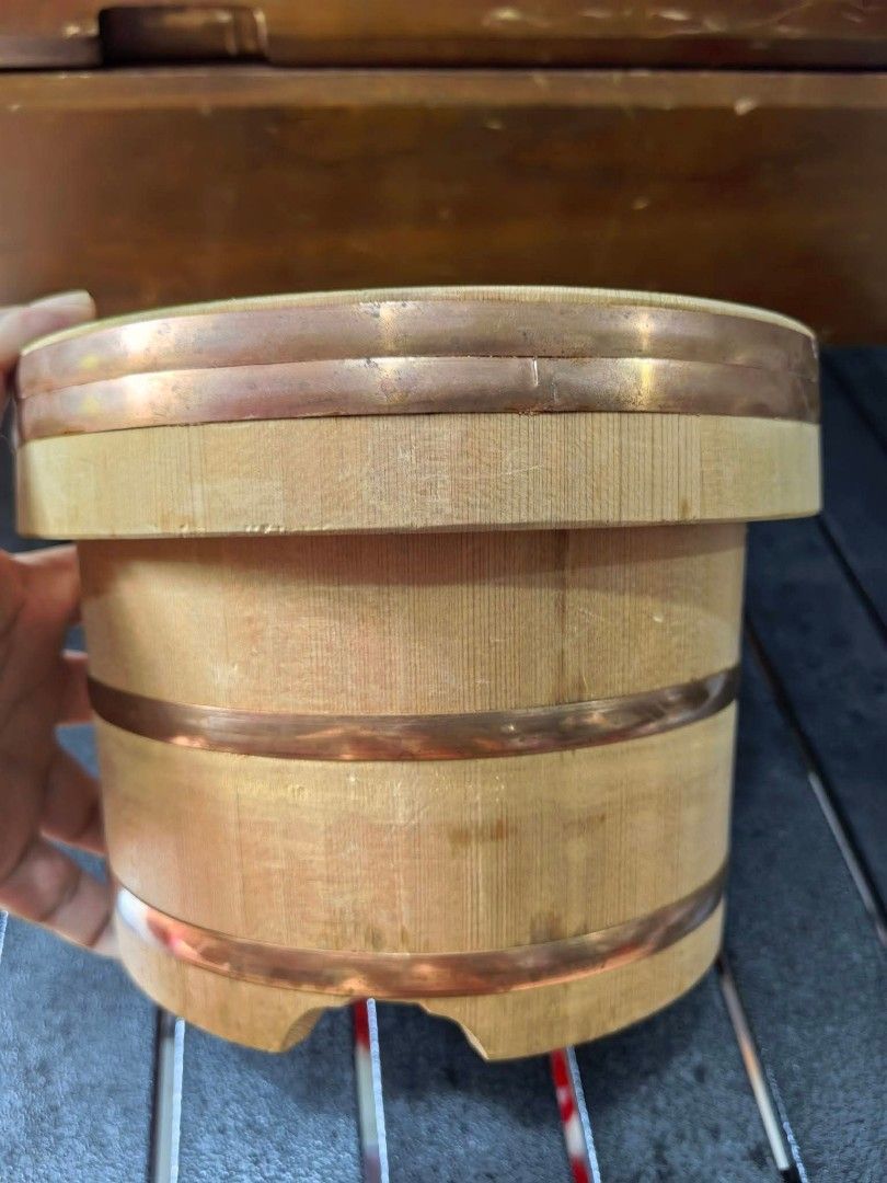 Japanese Wooden Rice Container (Category: Other Kitchenware & Tableware) located in Cebu City. Submitted by dudes_villanueva (Listing ID 1457961257, Image 3). Description: Japanese Wooden Rice Container 📌 Known as an ohitsu or edobitsu, reinforced with Copper metal bands. 📌 Type: Wooden rice tub or bucket with a matching lid. 📌 Material: Light-colored natural wood such as sawara cypress, bound with copper Bands. 📌 Purpose: Used to store fresh