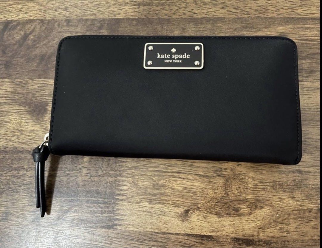 Kate Spade Wallet (Category: Wallets & Card holders) located in Manila. Submitted by bossprimeproperties (Listing ID 1457950610, Image 1). Description: Kate Spade black long wallet ₱5K negotiable .