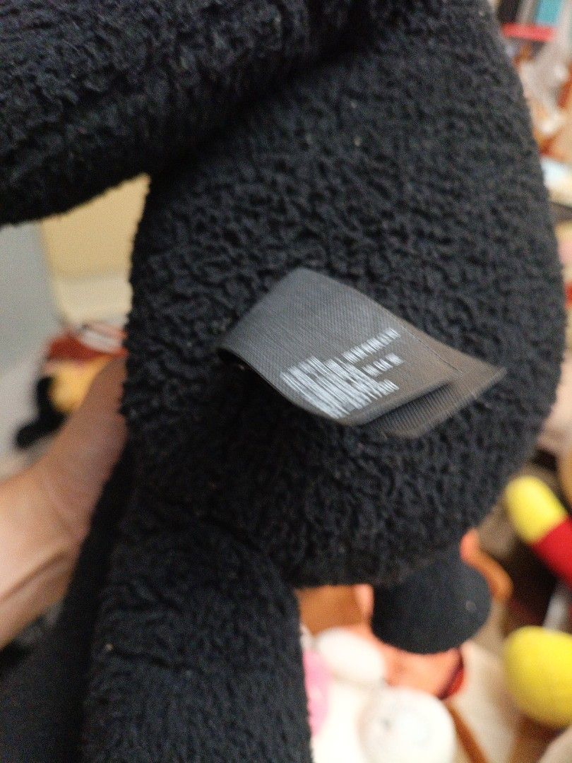 KAWS x PEANUTS Black Snoopy Plush Toy (Category: Plushies & Soft Toys) located in Mandaluyong City. Submitted by good_find_online_store (Listing ID 1457981039, Image 3). Description: - Authentic KAWS x PEANUTS collaboration plush toy - Features the iconic Snoopy character in black - Made from soft and fuzzy material - Approximately 15 inches tall - Ideal for collectors and fans of Snoopy or KAWS.