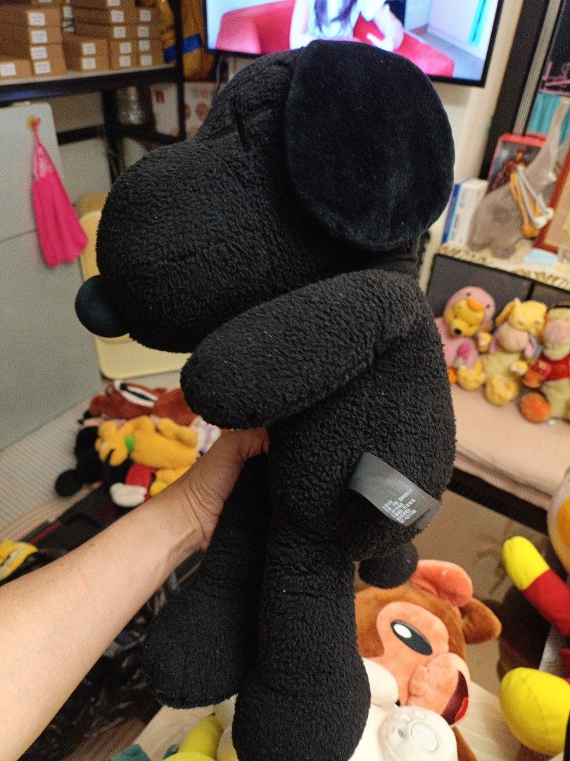KAWS x PEANUTS Black Snoopy Plush Toy (Category: Plushies & Soft Toys) located in Mandaluyong City. Submitted by good_find_online_store (Listing ID 1457981039, Image 2). Description: - Authentic KAWS x PEANUTS collaboration plush toy - Features the iconic Snoopy character in black - Made from soft and fuzzy material - Approximately 15 inches tall - Ideal for collectors and fans of Snoopy or KAWS.