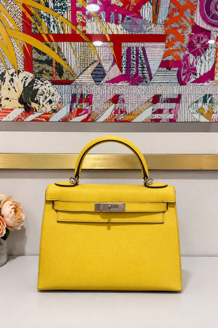 Kelly 28 (Category: Luxury Bags & Wallets) located in Taguig. Submitted by consumergoodstrading (Listing ID 1457961705, Image 1). Description: 𝗞𝗘𝗟𝗟𝗬 𝟮𝟴 Lime | Sellier | PHW A stunning Hermès Kelly 28 in vibrant Lime, featuring the iconic Sellier construction and elegant PHW hardware. The bold color and structured silhouette create a beautifully sophisticated statement piece. For More Information Pm Me Thanks.