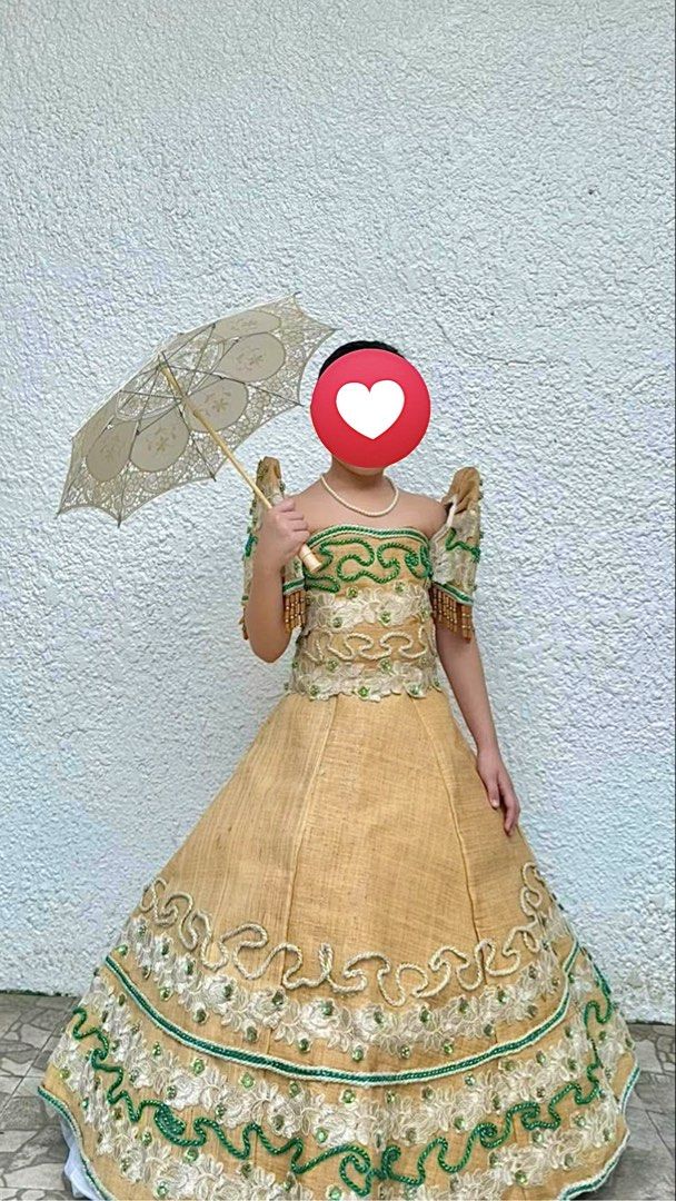 Kids Filipiniana (Category: Babies & Kids Fashion) located in Bulacan. Submitted by prelovedbycms (Listing ID 1458013319, Image 2). Description: 6-9 yrs old With peticoat For rent Beautiful yellow Filipiniana dress for kids. Features intricate beadwork and embroidery on the bodice and skirt. The sleeves have a unique design with beaded fringes. Perfect for cultural events or special occasions. The fabric has a natural texture. Comes with a pearl 