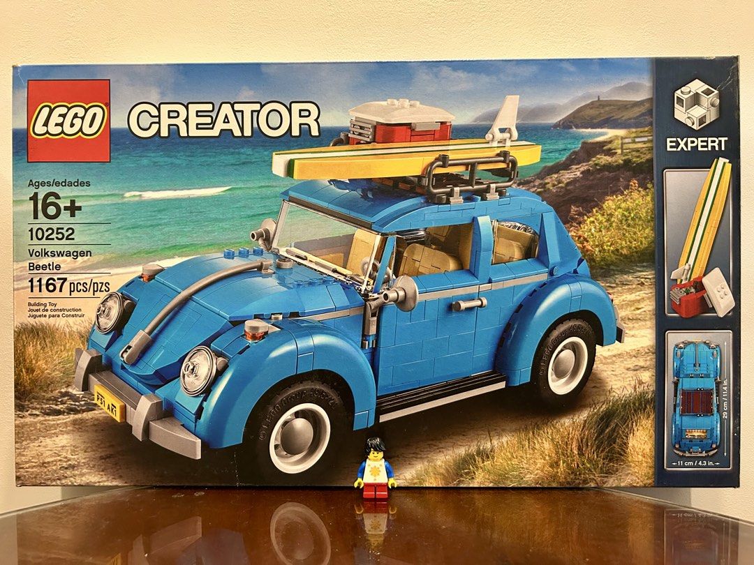 LEGO Creator Expert 10252 — Volkswagen Beetle (Category: Lego & Building Sets) located in Pasig City. Submitted by nobrainer.deals (Listing ID 1457957134, Image 1). Description: LEGO Creator Expert 10252 Volkswagen Beetle — 1,167 pcs | 2016. Iconic 1960s VW Beetle with detailed interior, opening hood, trunk and doors, authentic 4-cylinder air-cooled engine, surfboard and cooler box. Retired set. *** 'Pinoy' minifigure is for size reference only a