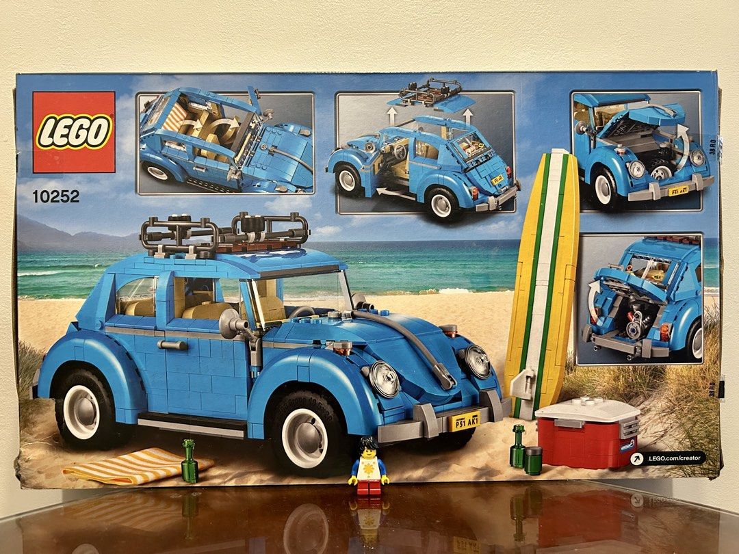 LEGO Creator Expert 10252 — Volkswagen Beetle (Category: Lego & Building Sets) located in Pasig City. Submitted by nobrainer.deals (Listing ID 1457957134, Image 2). Description: LEGO Creator Expert 10252 Volkswagen Beetle — 1,167 pcs | 2016. Iconic 1960s VW Beetle with detailed interior, opening hood, trunk and doors, authentic 4-cylinder air-cooled engine, surfboard and cooler box. Retired set. *** 'Pinoy' minifigure is for size reference only a