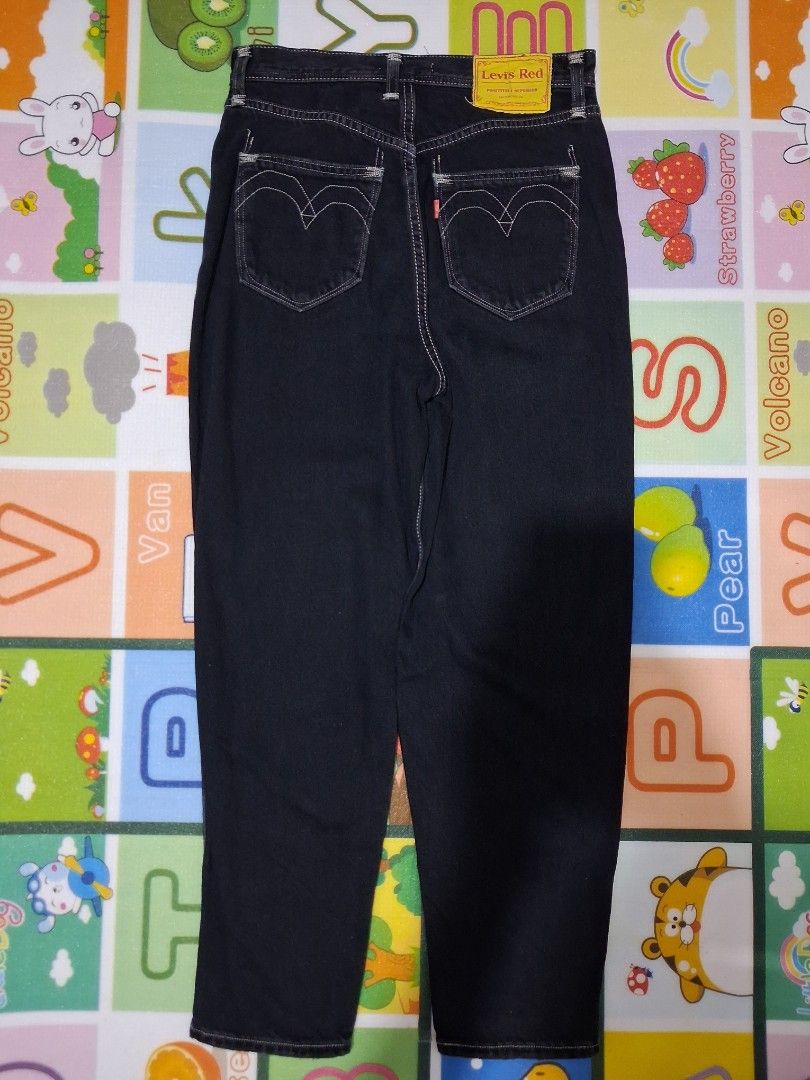 Levi's Red Tab Black Denim Jeans (Category: Jeans) located in Manila. Submitted by rossthrift (Listing ID 1457993881, Image 3). Description: - Classic black Levi's jeans - Straight leg fit - White contrast stitching throughout - Iconic red tab on back pocket - Measurements provided in photos - Perfect staple piece for any outfit.