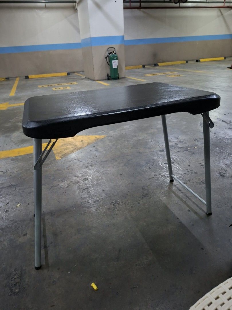 Lifetime USA Companion Table (Category: Tables & Sets) located in Pasig City. Submitted by phonefanatic (Listing ID 1457936480, Image 1). Description: Original Brown Lifetime Companion Foldable Table - Space-saving compact folding table - Ideal for small apartments or as extra surface area - Effortless setup and fold-away design - Dimensions (Open): 45.7cm W x 61.4cm L x 44.9cm H - Dimensions (Closed): 45.7cm W x 56.9cm L x 5.6cm H - Tabletop Thi