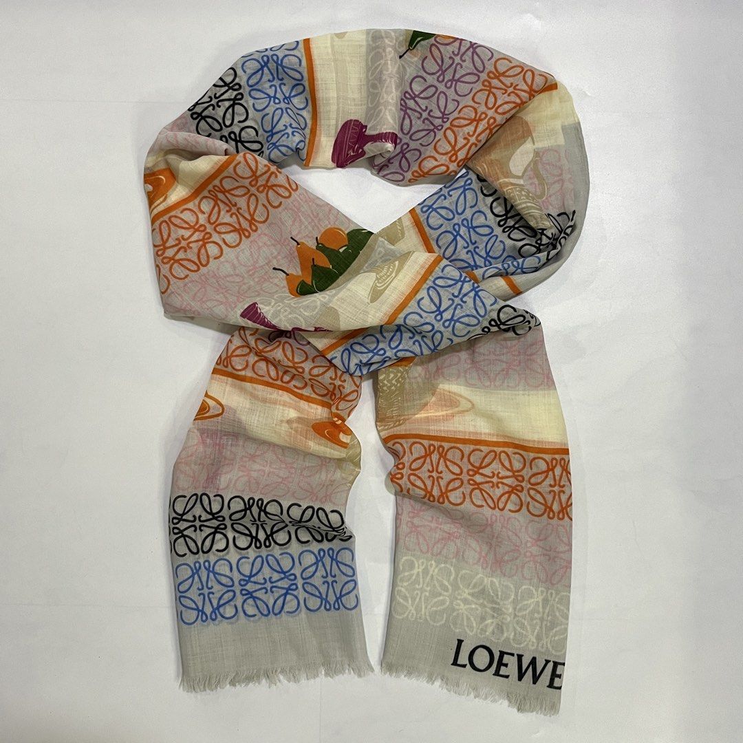 LOEWE ANAGRAM SCARF (Category: Luxury Accessories) located in Bacolod City. Submitted by the.finest (Listing ID 1458076012, Image 2). Description: Loewe Anagram and Botanical Motif Fringe Scarf Condition: 9.5/10 Flaws: None Width: 26 Length: 72 8,000+shipping fee.