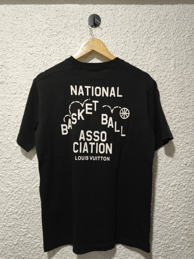 Louis Vuitton x NBA Black T-Shirt (Category: Tshirts & Polo Shirts ) located in Iloilo. Submitted by daddy_declutter (Listing ID 1458069836, Image 2). Description: L 27 x W 20 Black Louis Vuitton x NBA collaboration t-shirt. Features the LV logo on the front and NBA branding on the back. Made in Italy. Great piece for any fan..