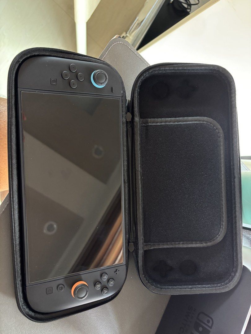 Lucky Fox Nintendo Switch 2 Carrying Case (Category: Cases & Covers) located in San Pascual. Submitted by riooow08 (Listing ID 1458040244, Image 2). Description: - Luckyfox carrying case for Nintendo Switch 2 - 2 weeks old pa lang RFS: mag try ng grip case.