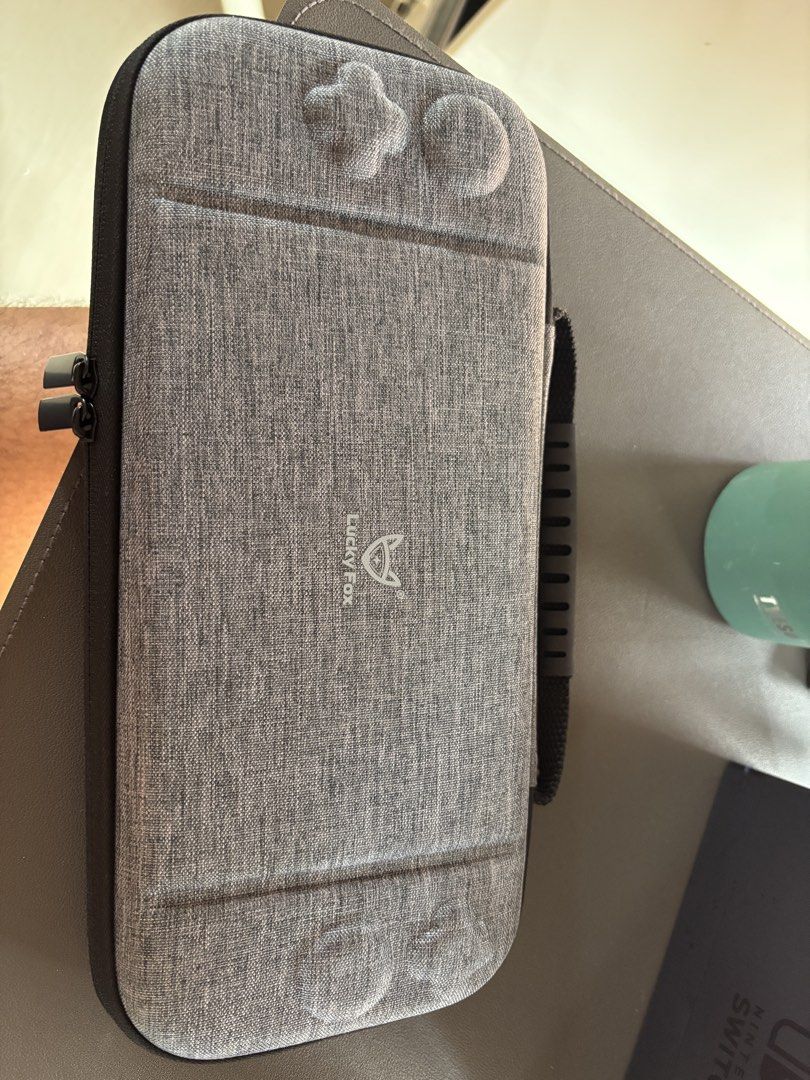 Lucky Fox Nintendo Switch 2 Carrying Case (Category: Cases & Covers) located in San Pascual. Submitted by riooow08 (Listing ID 1458040244, Image 1). Description: - Luckyfox carrying case for Nintendo Switch 2 - 2 weeks old pa lang RFS: mag try ng grip case.