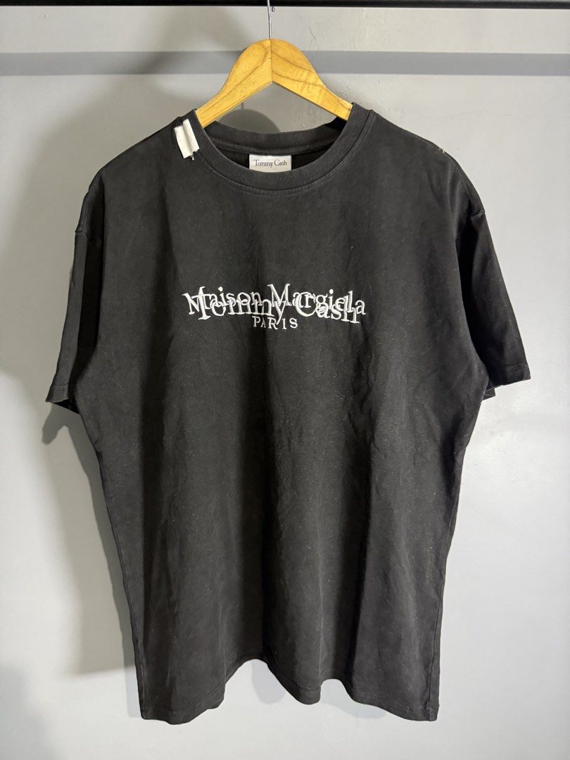 Maison margiela x tommy cash (Category: Activewear) located in Batangas. Submitted by robertlopezigaya (Listing ID 1457918889, Image 1). Description: Maison margiela x tommy cash Size L on tag Dimes 23x28 Color rate 9/10 Condition 9/10 Minor issue sa neck puti puti konti pero goods padin.